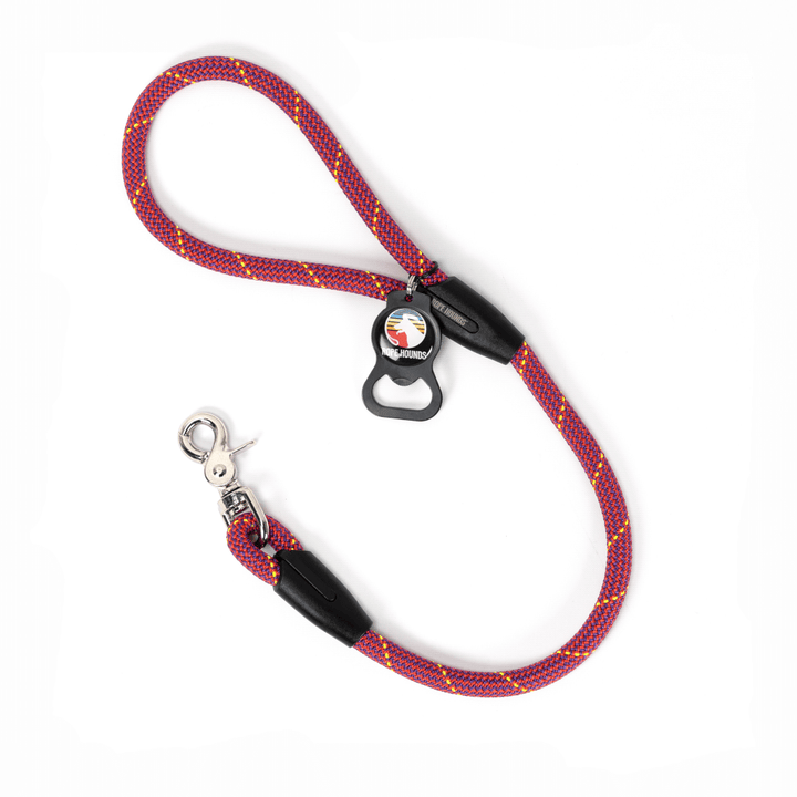 Pink and purple 2-foot dog leash made of climbing rope with a Rope Hounds bottle opener attached to the handle