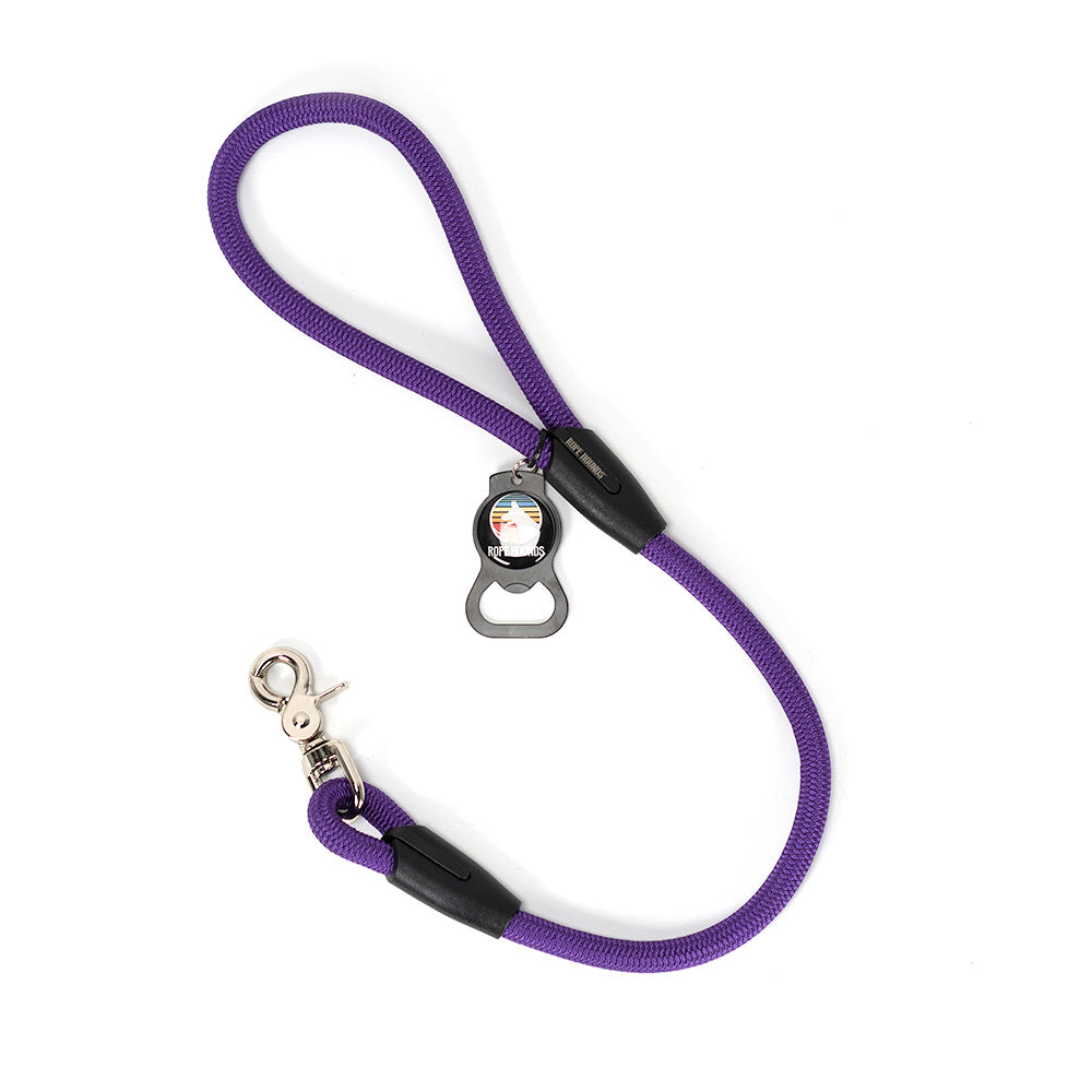 Pink and purple 2-foot dog leash made of climbing rope with a Rope Hounds bottle opener attached to the handle