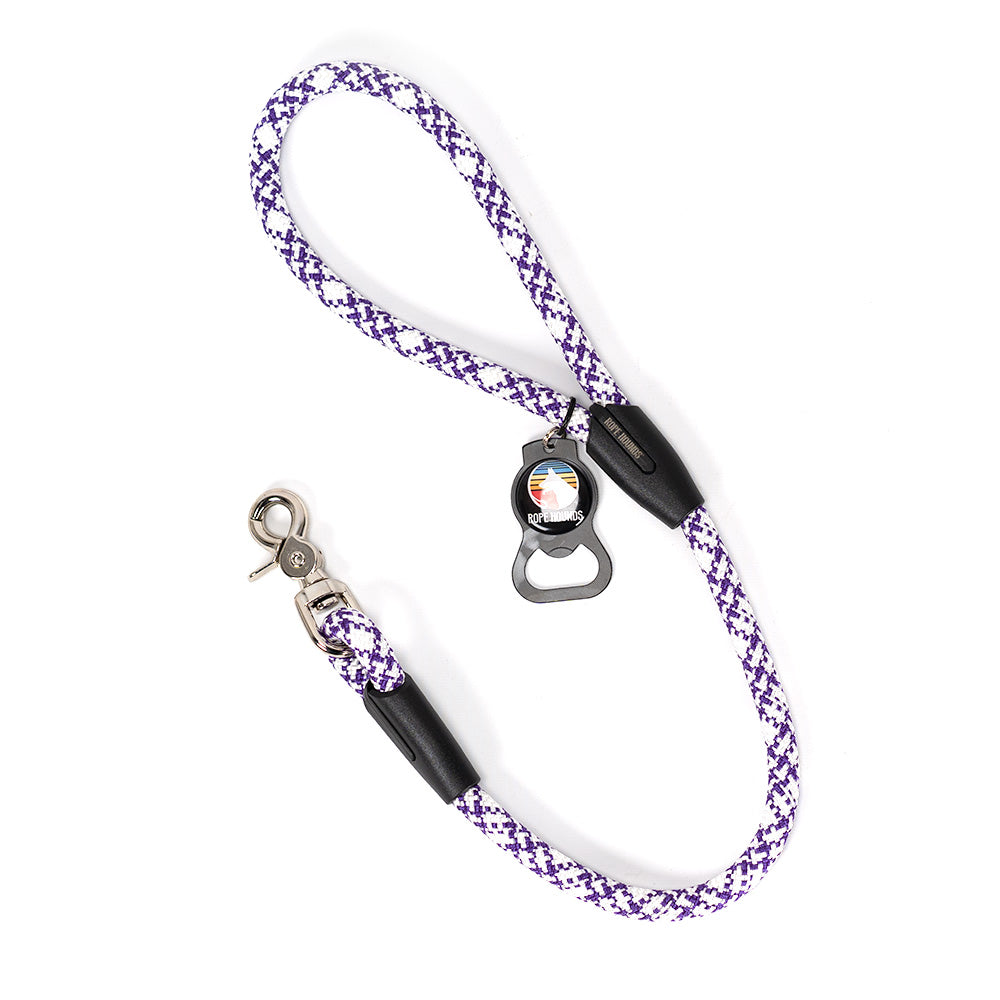 Pink and purple 2-foot dog leash made of climbing rope with a Rope Hounds bottle opener attached to the handle